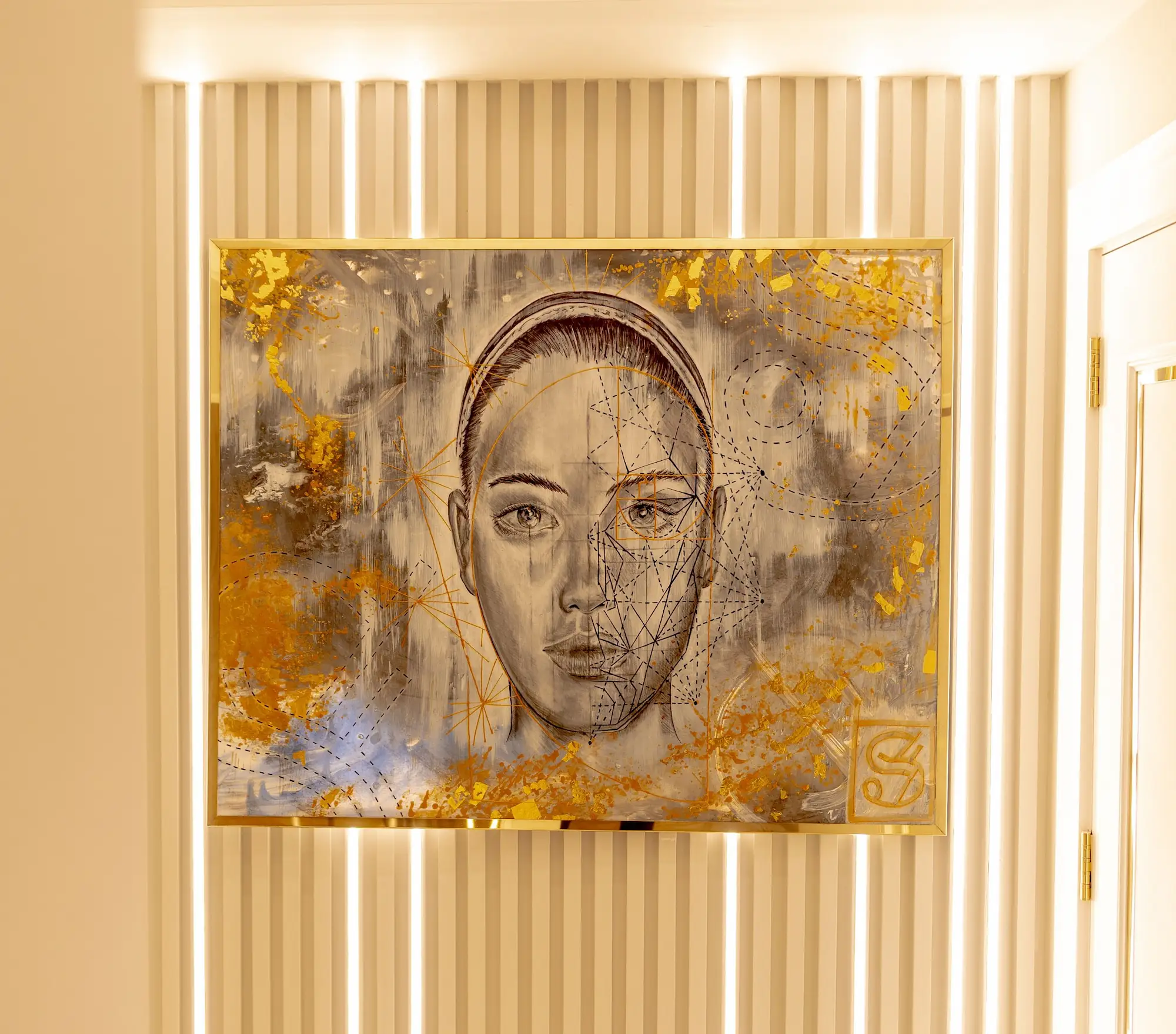 Gold-leaf portrait artwork at Skin Science Clinic