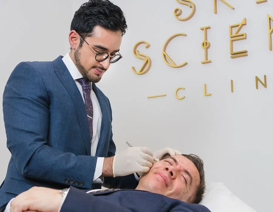 Dr Adil injecting Baby Botox at Skin Science Clinic in London