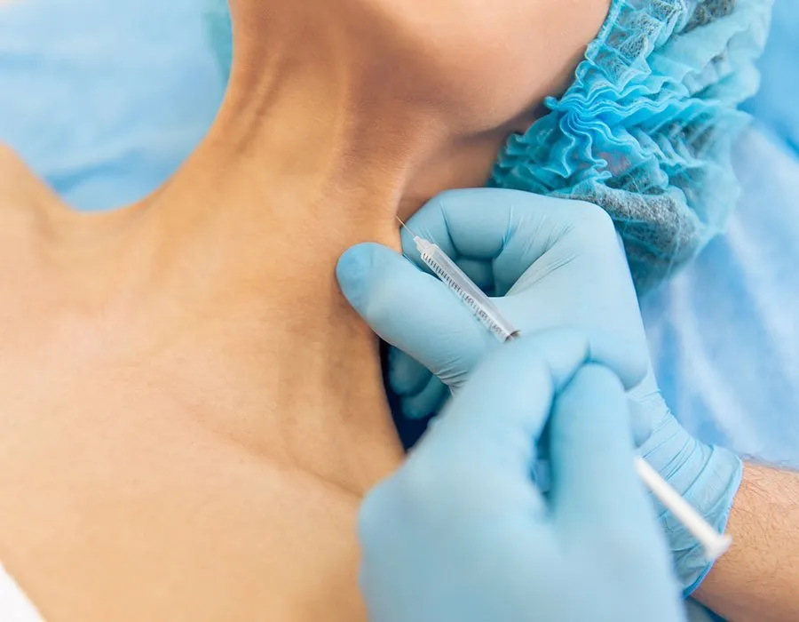 Woman having a Nefertiti treatment at Skin Science Clinic in London